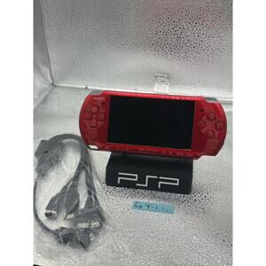 Red psp 3000 w/charger & new battery